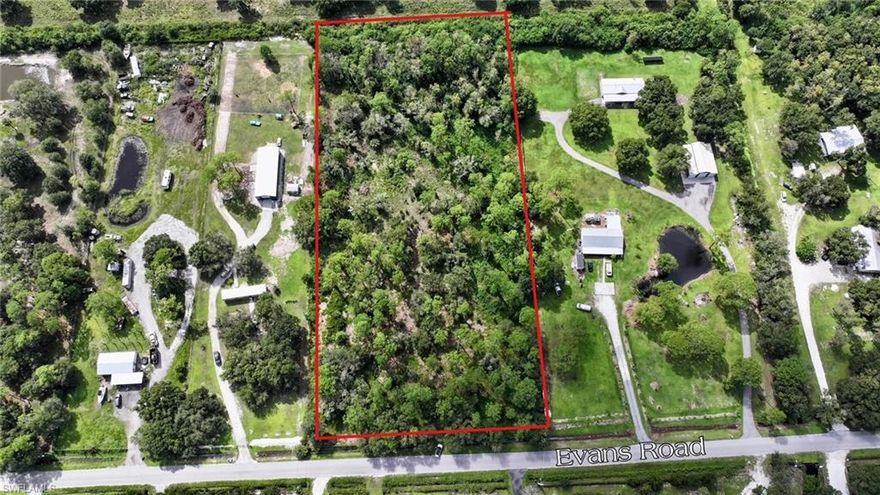 Discover this stunning 4.5-acre tract located on a paved road just minutes from the charming rural community of LaBelle, one of Southwest Florida's fastest-growing areas. Only 30 minutes from downtown Fort Myers, this property combines peaceful country living with convenient access to city amenities. The land has been thoughtfully cleared while preserving mature trees that provide shade, natural beauty, and privacy. It is partially fenced with double gates and features a picturesque, stocked pond with a center island- perfect for relaxing or enjoying the outdoors. With plenty of space for kids, pets, and livestock, this property is ideal for families seeking a true country lifestyle. The property offers excellent flexibility for future use and can potentially be divided through Hendry County for a family compound or resale. The surrounding area supports a mix of site-built, modular, and mobile homes, and outbuildings are easily permitted, making this a perfect setting to build your dream home or create a private rural retreat.