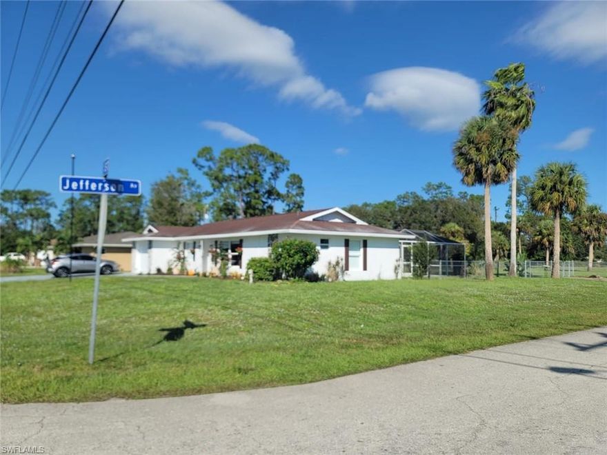 Seller is motivated to sell. Do NOT miss out on this beautiful corner lot pool home on half an acre fenced in! This property would be rented completely furnished. The location is great with quick easy access to Fort Myers and I75. Tile flooring in all 2 bedrooms and common areas with waterproof vinyl flooring in the kitchen and hallway. Updated electrical panel with generator hook up. Two storage units in the back yard along with beautiful landscaping including mango and avocado trees. Brand new pool liner and pool lanai. Come stay in this beautiful home. This property has a security system, safe.