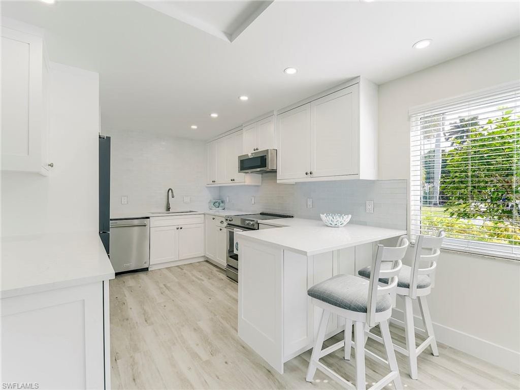 Photo of 354 Harbour DR #354, NAPLES, FL 34103 (MLS # 226004274)