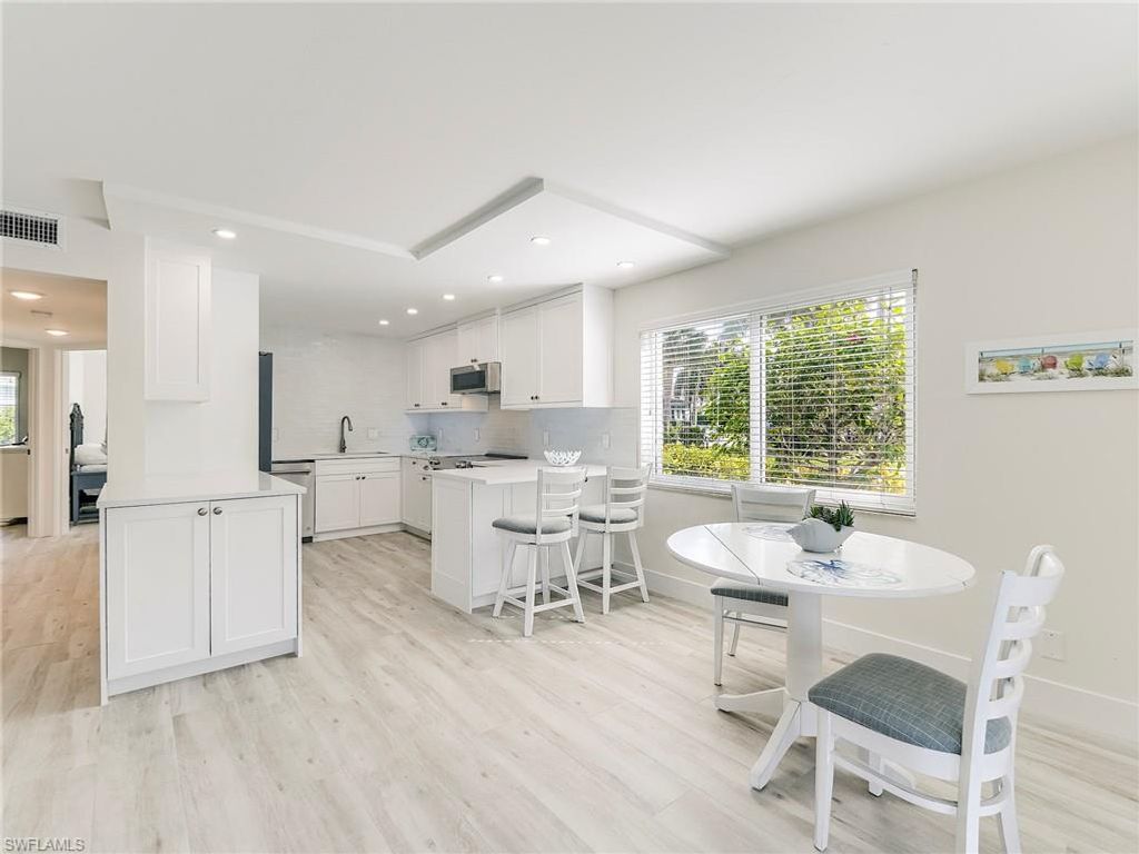 Photo of 354 Harbour DR #354, NAPLES, FL 34103 (MLS # 226004274)