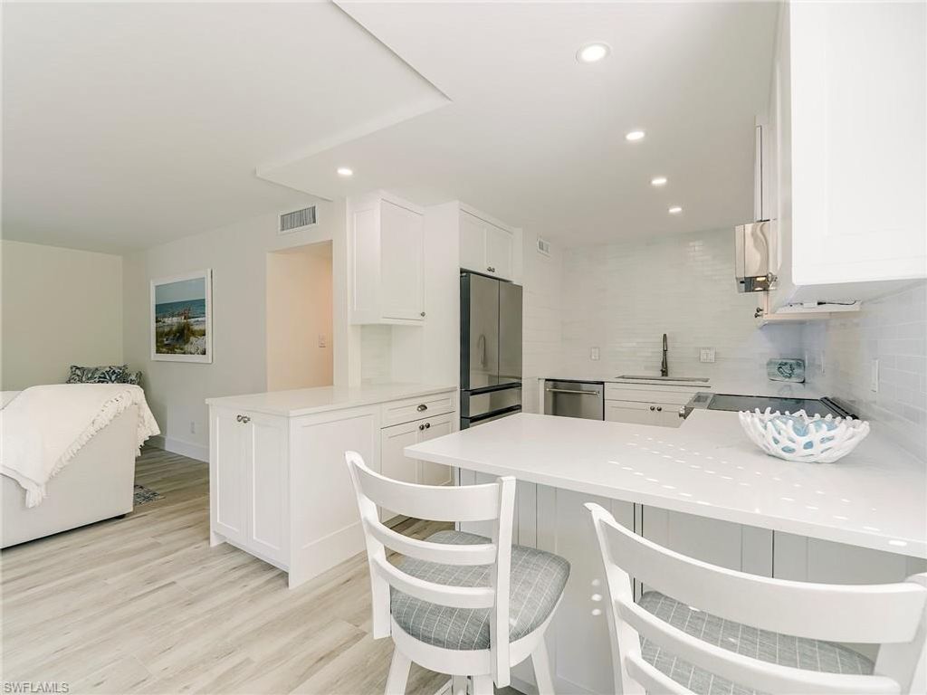 Photo of 354 Harbour DR #354, NAPLES, FL 34103 (MLS # 226004274)