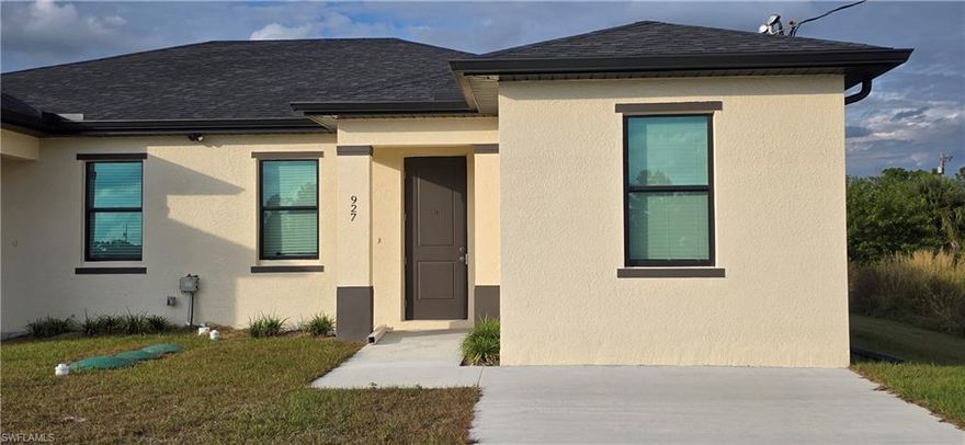 Be the first to live in this brand new 3-bedroom, 2-bath duplex located in the quiet and desirable Eisenhower neighborhood of Lehigh Acres. Designed with today’s renter in mind, this home offers a perfect combination of modern style, energy efficiency, and premium upgrades throughout.

Step into an inviting open-concept living and dining area, perfect for relaxing or entertaining. The gourmet kitchen is a true highlight, featuring elegant white shaker cabinets, upgraded quartz countertops, sleek stainless steel appliances, and bright LED lighting that enhances every detail.

This home is built for comfort and durability with impact-resistant windows and doors, a full Water Treatment System, and efficient lighting that helps keep energy costs down. Every room feels fresh, modern, and thoughtfully designed. Washer and dryer hook up. 

Both bathrooms are beautifully finished with frameless glass shower enclosures, stylish fixtures, LED lighting, and contemporary touches that elevate your everyday routine.

Additional features include:
• Private driveway parking
• Spacious bedrooms with great natural light
• Quiet street with minimal traffic
• Low-maintenance living with high-end finishes throughout

Perfectly located just 25 minutes from Fort Myers, this home offers quick access to everything you need. Nearby you’ll find schools, shopping, restaurants, parks, and convenient access to SR-82, making daily commuting simple and stress-free.

If you’re looking for a clean, modern, and comfortable place to call home, this beautifully upgraded duplex on 927 Chenault St is a must-see.
