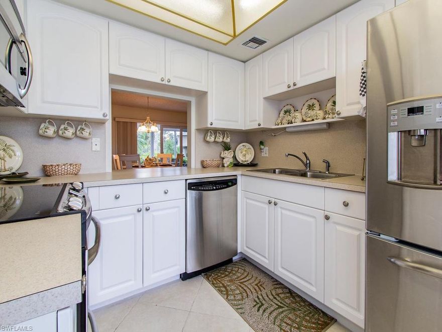 C.15236  3 miles to 10 miles of Gulf Beaches. First Floor. Offered Turnkey. Tastefully appointed,
updated golf pad. Tile throughout. Immaculate. Custom kitchen with Stainless GE Profile
appliances. Step outside and walk to pool to relax ! Impact glass sliders and windows.
Electric shutters on lanai. Private membership. Bundled golf with two 18-hole courses
(newly reconstructed): Par 70 (Open now) and par 55 (Re-opens Jan 2019). Enjoy resort
style amenities with Clubhouse, 10 Tennis courts, 9 pools, Bocce courts, Shuffle Board,
Pro-Shop and the private dining room at the 19th Hole. Glades Golf and Country Club is
the closest in to Old Naples and Fifth Avenue shops dining and Beaches with bundled golf.