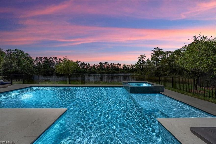 Immerse yourself in luxury with this meticulously upgraded 5-bedroom + Den, 5-bath home in Marina Bay featuring seamless indoor/outdoor living. Enjoy year-round relaxation in the new heated saltwater pool/spa surrounded by elegant shellstone pavers, the BEST LAKE VIEW in the community , mosquito mist system and fenced yard, ensuring ultimate comfort as well as thoughtfully plumbed for an outdoor kitchen & cable. The gourmet kitchen boasts top-of-the-line Jenn Air appliances, including an induction cooktop & double oven, a walk-in wood-paneled pantry & a convenient wine fridge & work island. Entertain effortlessly in the open living spaces adorned w/crown molding, tray ceilings, abundant natural light, tile & wood flooring, designer lighting, plantation shutters & neutral finishes creating an air of sophistication & warmth. Upstairs you’ll find beauty & practicality w/a loft & wet bar, laundry room, spacious primary bedroom & spa-like bathroom w/his & hers baths & spacious guest rooms. The 3-car garage provides ample space for your vehicles & storage needs. Don't miss the chance to experience the epitome of luxury living in this stunning residence with fabulous community amenities.