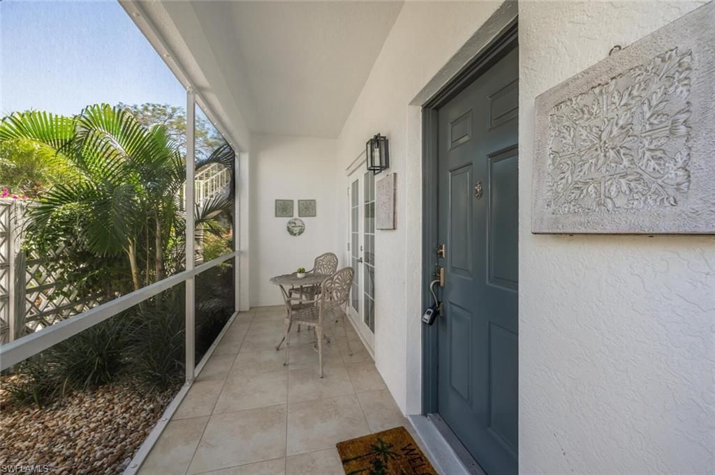 Photo of 886 Tanbark DR SW #103, NAPLES, FL 34108 (MLS # 225025687)
