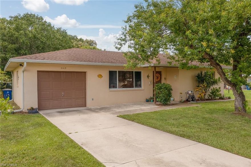SUPER CUTE (2) BEDROOMS, (1) BATH HOME SITUATED ON AN OVERSIZED, CORNER LOT IN FORT MYERS SHORES!  GREAT ROOM CONCEPT!  TILE FLOORING (NO CARPET)!  NEWER LIGHTING FIXTURES!  INSULATION ADDED TO ATTIC!  NEWER PLUMBING FIXTURES! NEWER ELECTRIC PANEL!  A/C SYSTEM REPLACED JULY, 2020!  10 X 12 SHED IN REAR!  OUTSIDE TERRACE!  THIS IS A VERY COMFORTABLE HOME THAT WOULD BE A PERFECT STARTER, RETIREMENT OR AN INVESTMENT HOME!  PER SELLER'S LENDER, NO FLOOD INSURANCE REQUIRED.