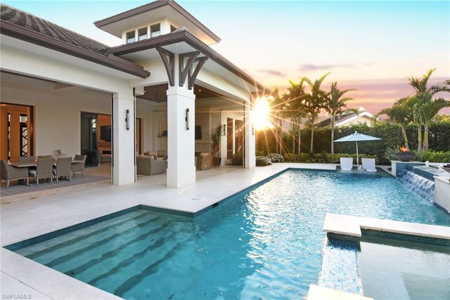 COME AND VISIT ME - I'M GORGOUES INSIDE AND OUT!  New open custom floor plan takes full advantage of the half-acre lot and offers a private master retreat, three guest suites, a gas chef-inspired island kitchen with full butler's pantry, and formal dining with adjacent wine cellar and wet bar.  Step outside to outdoor living and dining, summer kitchen and bar, accented by the resort-style pool and spa with water wall and fire bowls. There is a long list of special appointments-designer lighting, Ruffino cabinetry, Sub Zero and Wolf appliances, detailed millwork & ceiling treatments. Practical home features include Smart Home Control and Control4 Home Automation, motorized Lutron window treatments, Smartphone-controlled rolldown screens and hurricane protection, four car garage spaces-see the detailed list. Truly move-in ready, with all the final details complete.  As a Pelican Bay owner, enjoy the private beachfront restaurants, beach services, tennis programs, fitness and community center, canoes/kayaks/sailing, wellness studio & spa.  Golf memberships available at Club Pelican Bay. EASY TO SEE!