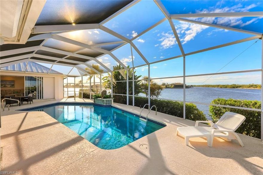 Located in one of the most desirable NW Cape Coral locations, this sailboat-access waterfront home offers over 2,700 sq ft under air, southern exposure, and more than 150 feet of unobstructed water views. The wide canal setting provides privacy, open vistas, and an ideal backdrop for Florida waterfront living.

The 3-bedroom, 2.5-bath layout includes a den/office, offering flexible space for working from home or additional living needs. Generously sized living and entertaining areas are filled with natural light, creating a seamless indoor–outdoor connection.

Built for durability, the home features a double-thickness concrete slab, reinforced construction, and a 24-gauge metal roof installed in 2023. Two separate A/C systems provide efficient climate control.

Outdoor living is highlighted by a 35-ft insulated pool with a no-see-um screened enclosure and pool heat pump (2023) for year-round enjoyment. A rare 3½-car garage includes an extended bay suitable for a mid-size boat, offering exceptional storage and flexibility.

A standout opportunity combining prime location, sailboat access, space, and expansive water views—the complete Cape Coral waterfront lifestyle.