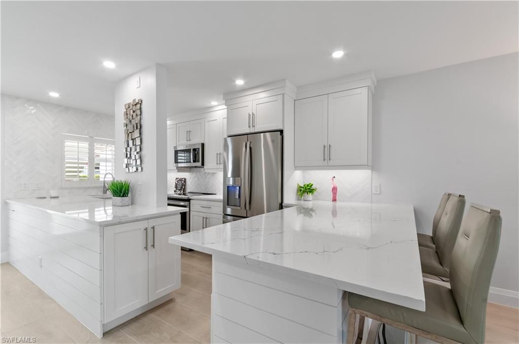 Photo of 664 Broad AVE S #J664, NAPLES, FL 34102 (MLS # 226013510)