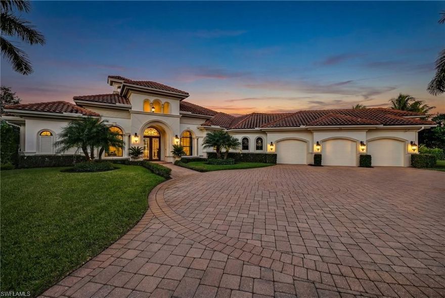 Set on one of the largest lakefront homesites in the community, this timeless 4 Bedroom residence plus a private office and 4 and a half baths offers the perfect blend of modern elegance and relaxed Florida living. Soaring ceilings and a beautiful mix of new wide plank light oak hardwood and tile flooring creating an airy, refined feel from the moment you enter, with spaces designed to transition seamlessly from formal gatherings to everyday comfort.  

Entertaining is effortless with a separate dining room and a custom wet bar complete with a wine cooler—ideal for hosting guests. The kitchen is a standout, featuring rich wood cabinetry, a center island, a walk-in pantry, 2 more wine coolers, and premium Viking appliances, including a natural gas cooktop. Casual dining is easy with bar seating and a sunny breakfast nook framed by a bay window overlooking the expansive outdoor living space.

The heart of the home is the family room, where high-impact pocketing sliders open wide to a spectacular resort-style lanai. Outside, enjoy true indoor-outdoor living with a full bar, outdoor kitchen, sparkling pool and spa, and dramatic fire bowls that set the scene for unforgettable evenings.

The primary suite is a peaceful retreat with a luxurious bath offering a separate soaking tub, walk-in shower, dual vanities, and designer lighting. Throughout the home, you’ll find thoughtful architectural touches including niche's  and extensive closet upgrades. Three additional bedrooms are configured as private en-suites, each offering comfort and privacy for family or guests.

Additional highlights include reconfigured pavers, new landscaping and landscape lights, new high-hats and dimmers throughout, a spacious laundry room with abundant cabinetry, sink, and built-in ironing board. The oversized three-car garage offers excellent storage, an air-conditioned closet, and even an additional washer and dryer—perfect for busy households and seasonal living.

Located within Mediterra, one of Naples’ most prestigious luxury communities, residents enjoy world-class amenities including two Tom Fazio championship golf courses, tennis, pickleball and bocce, a state-of-the-art fitness center, and miles of scenic biking and jogging paths. Dining is elevated at the private country club, while the exclusive Mediterra Beach Club delivers a true Gulf-front experience with a two-story, 10,000-square-foot facility featuring indoor and outdoor dining, a heated pool, sundeck, and full cabana service with chairs, umbrellas, and refreshments.

This is a rare opportunity on an oversized lakefront lot in Mediterra—where elegant living meets resort-style amenities. Don’t miss your chance to call this one home.
