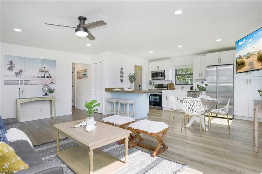 Step into your own piece of paradise with this immaculate home at 3455 Estey Avenue in beautiful Naples! Just a short distance from the world-renowned Naples beaches and luxurious shopping and restaurants on 5th Avenue, this REMODELED gem offers the perfect blend of convenience and luxury living. Boasting 3 spacious bedrooms and 2 full bathrooms with walk-in showers, every inch of this property exudes elegance and comfort. The interior has been thoughtfully updated with exquisite finishes in the kitchen, modern bathrooms, and new luxury
vinyl flooring throughout. Enjoy cooking in the stylish kitchen complete with quartz and butcher block countertops, and new stainless-steel appliances. The IMPACT RESISTANT windows and doors provide peace of mind, while the fresh exterior paint and decorative shutters add to the charm of this corner lot property. Step outside to your large private backyard oasis framed by tropical landscaping and envision hosting gatherings in the outdoor living space perfect for entertaining. What's more, there are NO HOA FEES, no pet limits, and no restrictions on rentals, offering great flexibility for investment purposes. This TURNKEY home comes fully furnished, making it an ideal option for personal use or as a rental property. Whether you are seeking a permanent residence, a vacation getaway, or an investment opportunity, 3455 Estey Avenue provides the perfect canvas for your Naples lifestyle dreams.