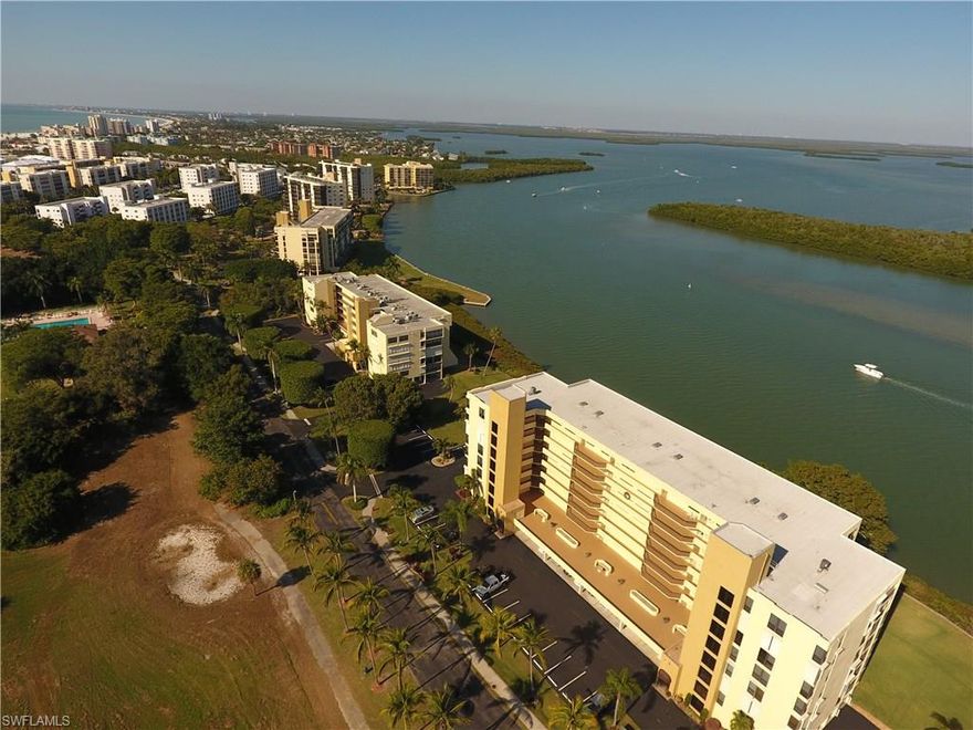 Expansive Estero Bay views from the living areas and large balcony of this beautifully remodeled 6th floor  3BD/2BA corner unit at the Palms of Bay Beach. This property has tile throughout, large open living area with large base trim, kitchen with granite, tile and backsplash, stainless appliances and new cabinets. Large eat-in area. Both baths have granite as well with new tile in shower and tub areas as well as new vanities, fixtures and mirrors. Three entries to balcony from living areas. New ceiling fans/lights. Partial gulf views from all bedrooms. Both guest rooms have walk-in closets and the master features a large walk-in closet with built-in organizer. Electric hurricane shutters for storm protection. The community offers deeded beach access as well as a community room, fitness center, fishing pier, tennis courts and BBQ. Gulf access boat docks are often available for purchase or lease as well. Just a short walk down the quiet, tree-lined street to restaurants, shopping, public marina and THE BEACH.