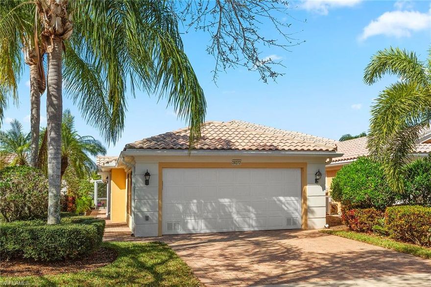 Enjoy spectacular sunsets from your western-facing screened-in lanai. Exceptionally maintained villa with a two-car attached garage. Popular Capri floor plan offers relaxed and open-concept living space. New quartz countertops, mirrors, toilets and fixtures in the bathrooms. The kitchen boasts stainless steel appliances. Hurricane shutters and impact front door. Extra storage with walk-in closets and attic storage in the garage. The pool area looks out to a serene water view with plush landscaping. Stroll or ride your golf cart to the bustling Town Center noted for amenities such as an active clubhouse, mail center, restaurants, tennis, pickleball, basketball, 24-hour gym, neighborhood garden, hair salon, spa and more. Gas station and car wash for your convenience. Winter no more.