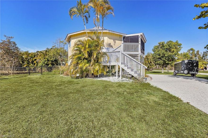 Welcome to this unique Octagon home near the northern tip of Pine Island. Enjoy a stroll to Pineland Marina, learn about the Calusa Indian Mounds while visiting Calusa Heritage Trail, or wind down over a relaxing dinner while watching a beautiful sun set at Tarpon Lodge by the water.

Bring your imagination, as this home is perfect for a single-family or an investment property with separate living quarters. The home offers two bedrooms and two full baths, a spiral staircase, impact-resistant windows, and a wonderfully expansive, screened balcony. There are plenty of built-in outdoor storage, a shaded, private patio for those warm days, and a great fenced yard for your four-legged family members to enjoy. This home has great bones and offers a wonderful opportunity to make it your very own.
