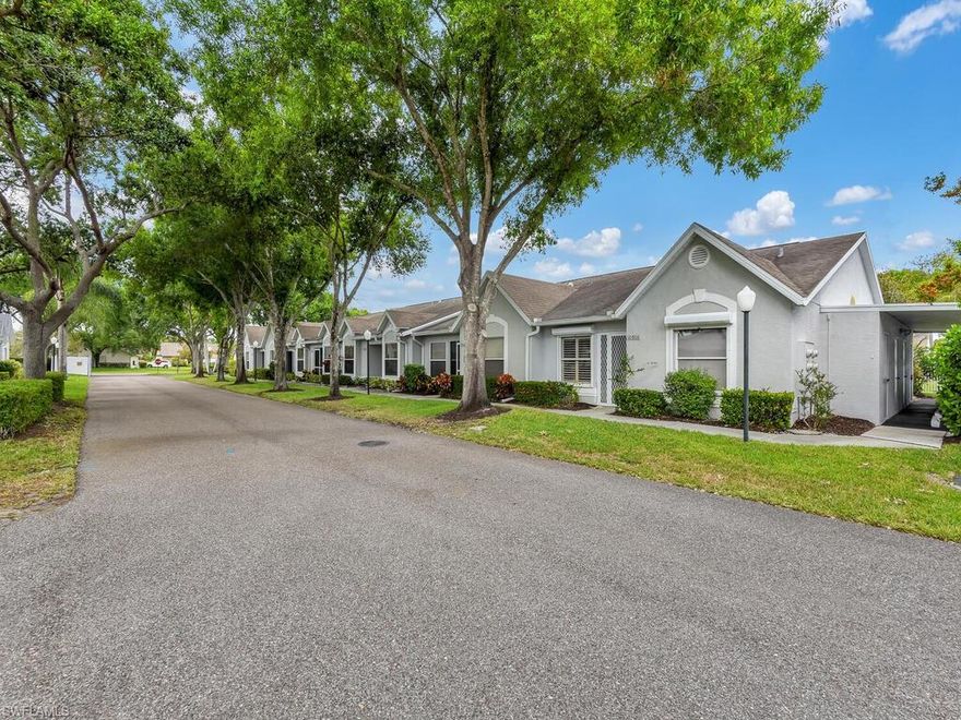 *MULTIPLE OFFERS HAVE BEEN RECEIVED* PLEASE SUBMIT all offers by Sunday, May 1st by Noon. Match your home to your lifestyle!  Greetings from the front door welcome you with gorgeous laminate flooring throughout and both bedrooms to your left and right.  Straight from the long entryway, you will be lead to the living area to your right and dining area to your left.  The chef in you will be pleased to find granite countertops, plentiful counter space, and bright light  to wow any events that you plan!  Entertainment is made easy with spill-over counter space to seat your guests as an added bonus to this eat-in kitchen.  Enjoy your enclosed lanai that lives like a second living area via both the kitchen and living area.  This home includes storm shutters off the lania, laundry in residence, carport space, and close proximity to the community pool for peace of mind.  Regent Park is located in North Naples, one of the best school systems in Collier County.  West of I-75, you are only 5 minutes from the interstate, 10 mins from the beach, and a 20 minute drive to Downtown Naples!