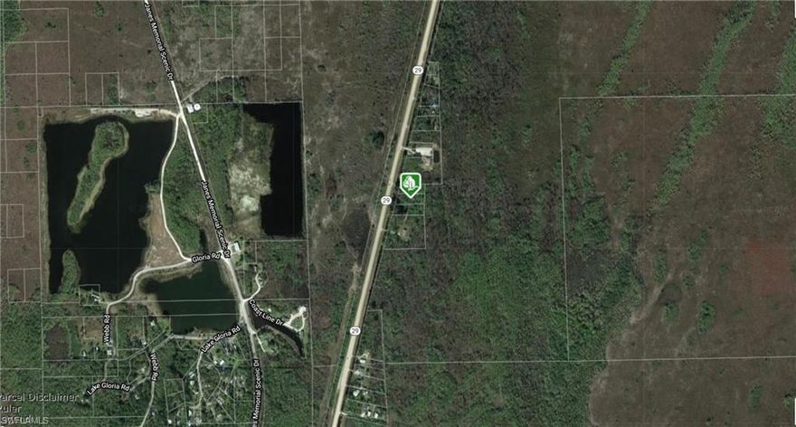 vacant lot of major road of 29, lots of privacy, very tranquil area to the everglades and Copeland Village, no HOA, as-is only, buyer is due diligence