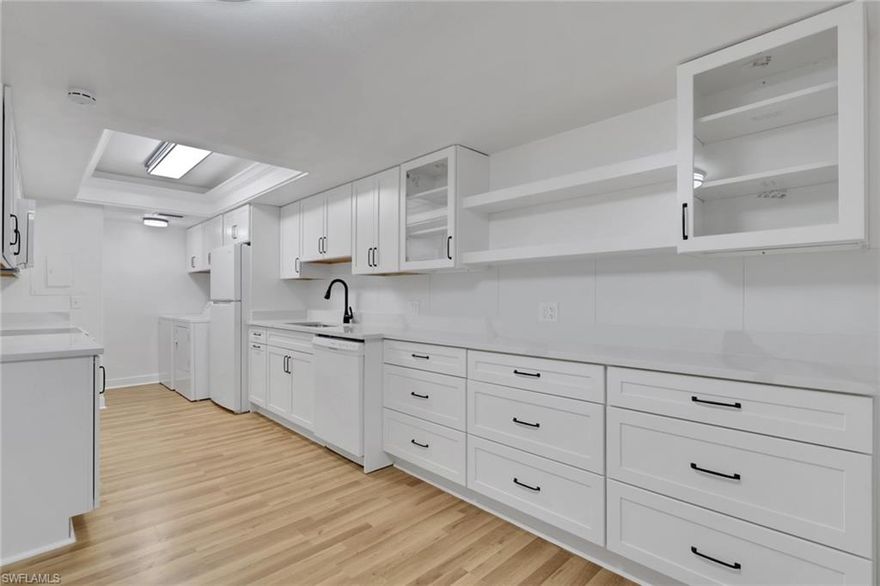 FULLY Remodeled 2nd floor Unit with Brand New Kitchen, New Bathrooms, New Laminate Floors, Freshly Paint and is move in ready. Spacious 2/2 with washer and dryer inside unit. Lots of natural light. Pool/Jacuzzi on premises. 18th Public golf course on back of building. 1 Carport included in unit. Elevator Access to all building floors. No Pets. BASIC CABLE/BASIC INTERNET/WATER INCLUDED IN RENT.