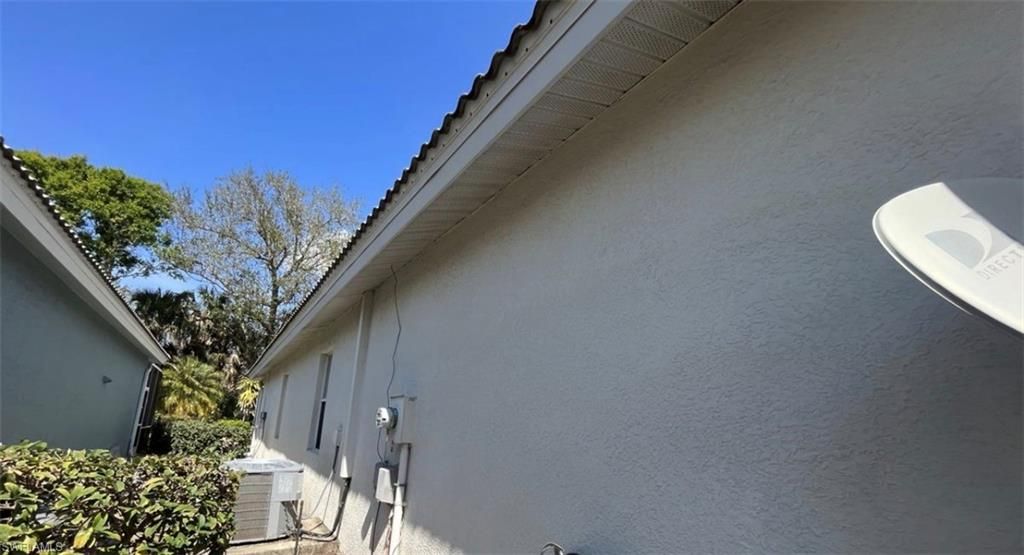 Photo of 9894 Colonial WALK N, ESTERO, FL 33928 (MLS # 226013977)