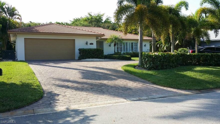 H.8318 - Your own putting green is just one of the many wonderful features of this Park Shore Pool home remodelled in 2006. Situated on a tranquil lot with circular paver drive this home has had a major remodel and shows beautifully.  You will love the granite gourmet kitchen and stainless appliances; updated bathrooms and open floor plan. Only 3 blocks to the beach Walk to The Village of Venetian Village upscale shops and restaurants or enjoy the beauty of the private Park Shore Club Beach exclusive to residents of this very desirable community located in the heart of Naples.