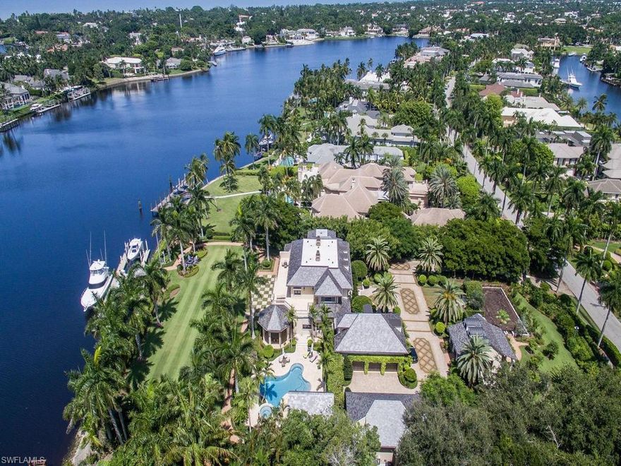 This significant waterfront estate with dual gated driveways includes two large master bedrooms, a chefs kitchen and poolside cabana. The six bay collectors garage holds nine cars, with a separate guest house or nanny quarters. This property boasts phenomenal views from every room to ensure maximum relaxing or entertaining. A 1000 bottle wine room, state of the art electronics and whole home automation ensure quality of life and lifestyle. Outdoors the organic vegetable, fruit and butterfly gardens are unsurpassed in variety and quality. This home has been completely redone with hospital grade A/C ductwork, new plumbing and three new water heaters. The entire home water filtration system is new as well as all electrical panels and security system. Stunning outdoor space with wood burning fireplace adds ambience to the pool redone with mother of pearl glass tiles. The open and airy cabana sits serenely on 200 hundred feet, with a spectacular 100 foot floating dock on Galleon Cove.