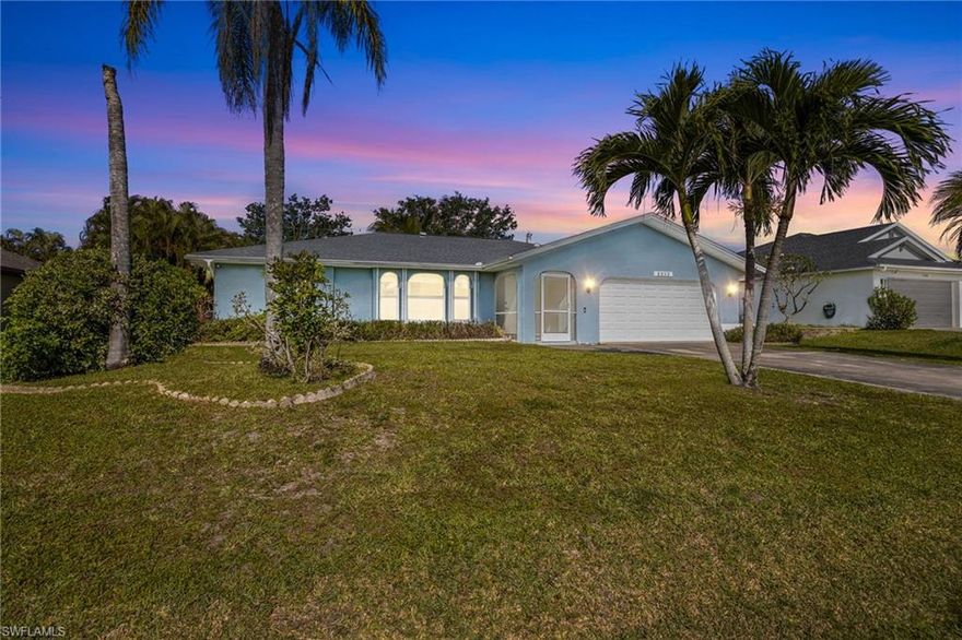 WESTERN rear exposure for sunsets in your large, fenced-in backyard with room for a pool and spa.
Come see the least expensive single-family home within a half-mile by over $25,000!

This home offers full hurricane protection, a newer water heater, and fresh carpet in the guest bedrooms. Separate family and living rooms plus a dedicated dining area. Your outdoor space offers a huge lanai with plenty of outdoor living area and mature citrus and avocado trees. 

Centrally located near restaurants with quick access to Veterans Parkway for an easy commute to Fort Myers.

You're walking distance to Palmetto-Pines Country Club, offering public golf and dining, and Fellowship Park, featuring a splash pad and playground perfect for the kids. You’re also just 20 minutes from Cape Coral’s vibrant downtown, filled with year-round events, dining, and entertainment, as well as the Cape Coral Yacht Club, the city’s only beach. Enjoy nearby waterfront favorites like Tarpon Point Marina and Cape Harbour, or explore nature at Four Mile Cove Ecological Preserve with scenic walking trails and a fishing pier overlooking the river.
No flood zone. No flood insurance required.