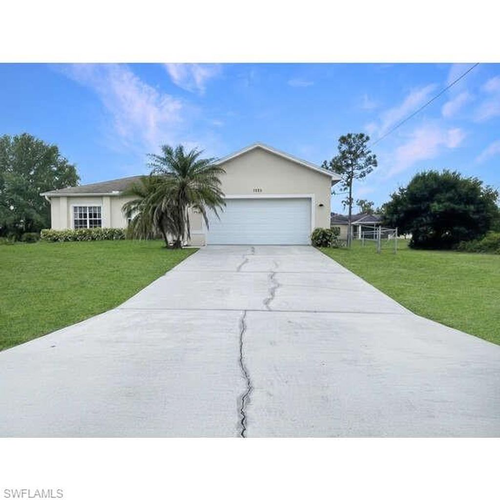 Photo of 1252 Delores ST E, LEHIGH ACRES, FL 33974 (MLS # 226013679)