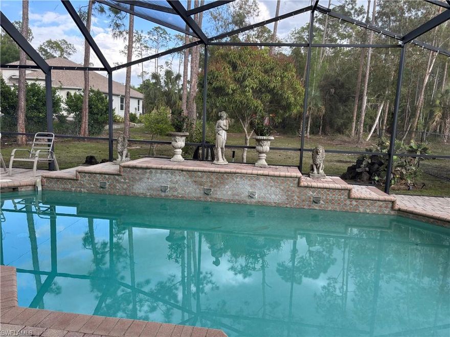 NO HOA – Move-In Ready Tomorrow | 3 bedroom\2 bath Private Heated Pool Home on 1.5 Acres in Oakes Estates FURNISHED SEASONAL or ANNUAL rental ** Golden Gate Estates Oakes Estates **Welcome to your private retreat in Oakes Estates, located within Golden Gate Estates. This beautifully maintained single-family home offers 1,940 square feet of comfortable living space on a sprawling 1.5-acre lot, providing the peace, privacy, and space you’ve been looking for. Beautifully and thoughtfully organized inside with everything you will ever need!

This home features a private gated entrance for added security and a serene setting with preserve views. Enjoy your own heated pool and outdoor oasis, complete with a fully equipped outdoor kitchen, BBQ, separate grill, and even a dishwasher—perfect for entertaining guests or relaxing poolside.

Offered fully furnished for a true turnkey experience—just bring your toothbrush and bathing suit!
Inside, the home features a split-bedroom floor plan with 3 spacious bedrooms, all furnished with queen-sized beds.

The primary suite includes a large walk-in closet and a private bathroom with a walk-in shower. Additional highlights include modern “fandeliers” throughout, towel warmers in the bathrooms, and a decorative, fully functional fireplace in the main living area with large Smart TV.

The chef’s kitchen is fully stocked with stainless steel appliances and an extensive collection of small appliances—everything you need to feel right at home. Smart TVs are installed in the primary bedroom, living room, and lanai, allowing you to easily log into your favorite streaming services.

Step outside to enjoy multiple outdoor living spaces, including a quiet patio with a tranquil fountain—ideal for reading or unwinding. The property also includes a basketball court and ample parking.

Additional features:
Built in Full-size washer and dryer inside the home
Pool and beach towels provided
Plenty of sleeping accommodations, including extra mattresses for guests
Sorry, Garage not included
No pets permitted

Located in a highly desirable school district and just minutes from shopping, dining, and entertainment. Only a short drive to Vanderbilt Beach, famous Mercato for dining and shopping, and Southwest Florida’s beautiful white powdery sand beaches. East of I-75, north of Vanderbilt Beach Road, and south of Immokalee Road.

This is a rare opportunity to enjoy privacy, space, and luxury living in the heart of Naples.

Seasonal Rates & Availability:
Jan-April: $7500 a month
May-Sept: $3950 a month
Oct-Dec: $6500 a month

Annual 12-month rate: $3950 a month
Tenant would be responsible for electricity, cable
Owner would be responsible for trash, lawn and pool maintenance, septic and internet
First month's rent, last month's rent and security deposit due prior to move in