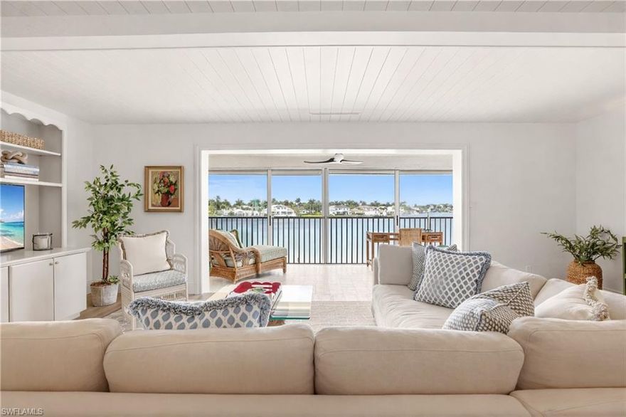 Penthouse Living with Panoramic Moorings Bay Views

Completely reimagined by an award-winning UK designer, this prime top-floor end-unit penthouse in Moorings Bay offers exceptional privacy, all-day sun, and sweeping south- and west-facing views over the bay and waterfront estates. Taken to the studs and fully reconfigured, this beautiful residence features new wood flooring, designer lighting on dimmers, tongue-and-groove detailing, and all-new electrical, plumbing, and ductwork.

The stunning new kitchen includes quartz countertops and all-new appliances. Additional highlights include a steam shower, plantation shutters, new windows and doors, fiber optic internet, new A/C system, water heater, and electric storm shutters (2025).

This exclusive 24-unit community offers boat slips (up to 35 ft, low annual cost), bridge-free Gulf access, pool and tiki area, BBQ, bike and private storage, and is just a 5-minute walk to the beach with easy access to Venetian Village and Olde Naples.

Recent Association upgrades include full electrical modernization, new landscaping (2026), pool deck and equipment, lighting, seawall, and docks. Well-managed with no issues in Milestone or SIRS reports.