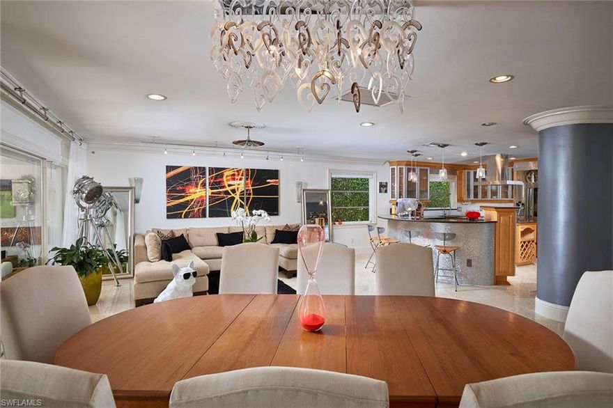 Southwestern views of Moorings Bay sparkle from the extended backyard and dock area of this nicely renovated single-family home situated in the quiet Leeward Ln neighborhood. Light Saturnia marble floors, floor to ceiling sliders framing the back, contemporary track lighting and renovated bathrooms with raised vanities provide an elegantly modern motif. The fresh kitchen mixes stainless steel and wood shaker cabinets and is brought together by a convenient center island with freestanding hood all seamlessly opening to the living area and water view beyond. The crisp pool and travertine deck are surrounded by lush landscaping and provides a relaxing space to enjoy the sun during the day and sunsets at night. Encompassing 4 bedrooms and 4 baths with an expansive master suite, custom outdoor shower, 2 car garage and quick access to the Gulf, this is a great opportunity to live on the water in style and comfort.