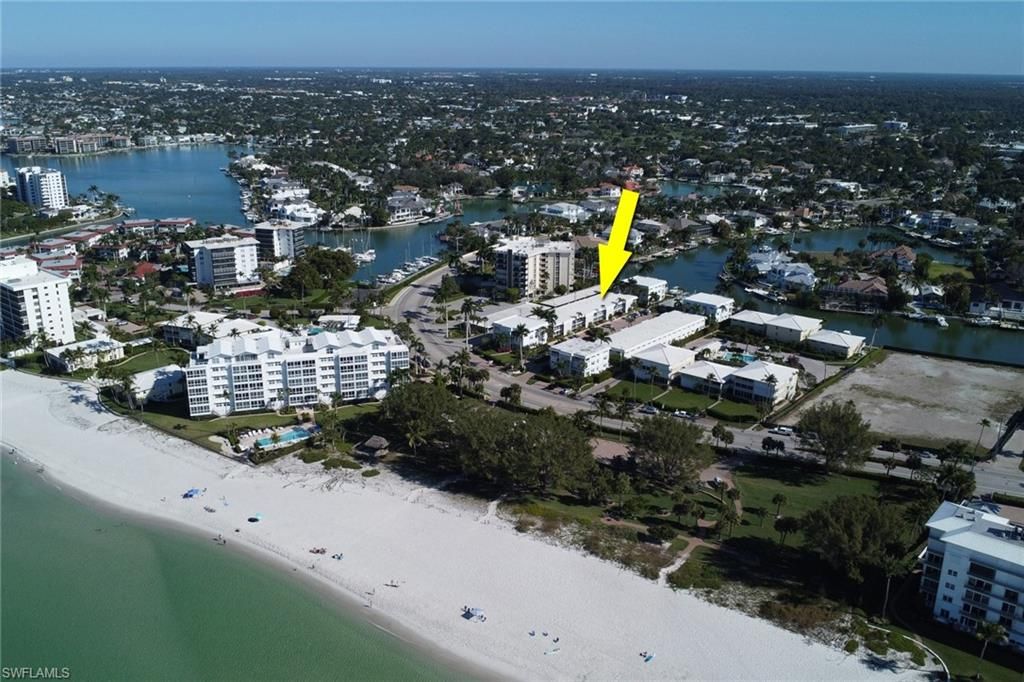 Photo of 2100 Gulf Shore BLVD N #113, NAPLES, FL 34102 (MLS # 225085004)
