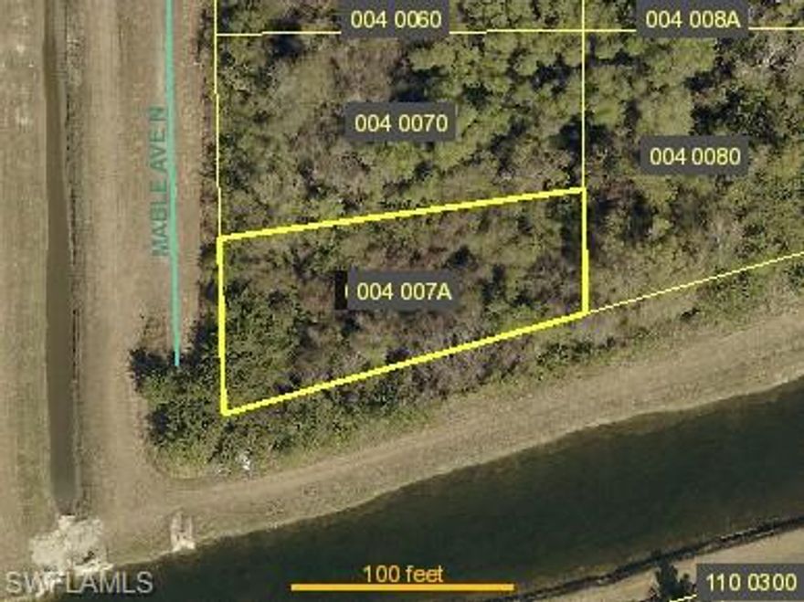 Oversized corner canal-front lot in a growing area of Lehigh Acres. Located on Mable Ave N and backing to the Able Canal, this property features desirable southern rear exposure, ideal for bright backyard living and future pool plans. The widened canal frontage provides added privacy and a more spacious rear layout compared to standard interior lots.

Approximately 0.26± acres with paved road access and convenient proximity to 26th St W, Sunshine Blvd, schools, shopping, and dining. No HOA. Suitable for a custom single-family residence with flexibility in home and outdoor design.