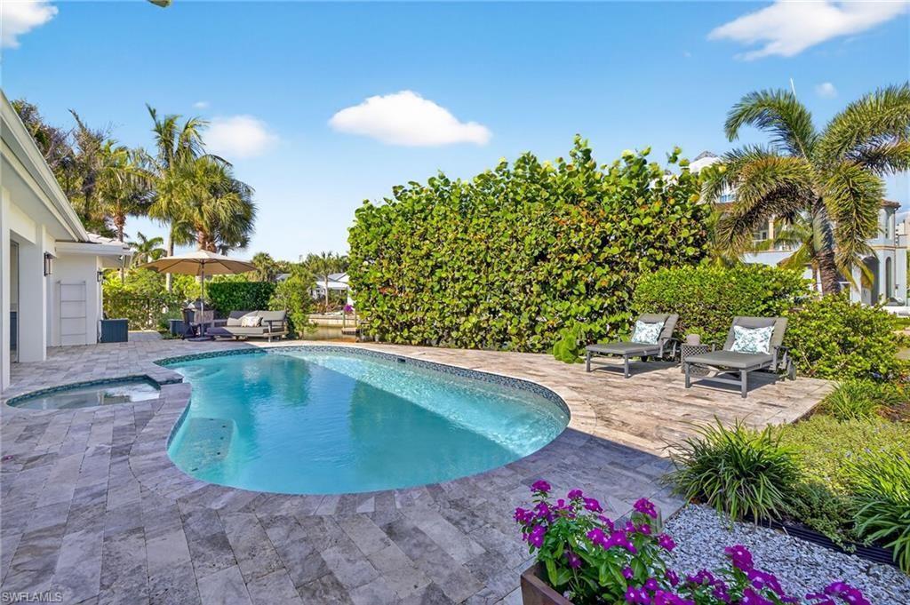 Photo of 5215 SEASHELL AVE, NAPLES, FL 34103 (MLS # 225063659)