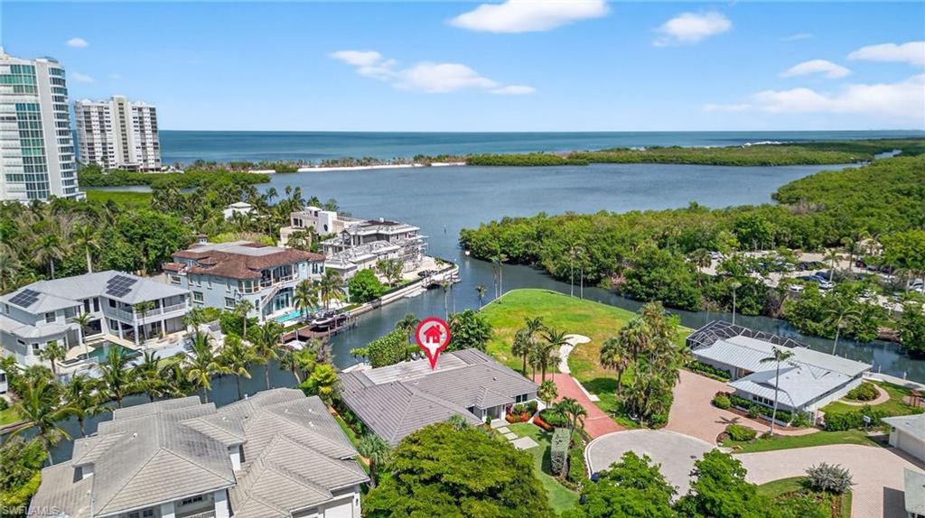 Photo of 5215 SEASHELL AVE, NAPLES, FL 34103 (MLS # 225063659)