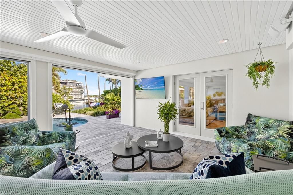 Photo of 5215 SEASHELL AVE, NAPLES, FL 34103 (MLS # 225063659)