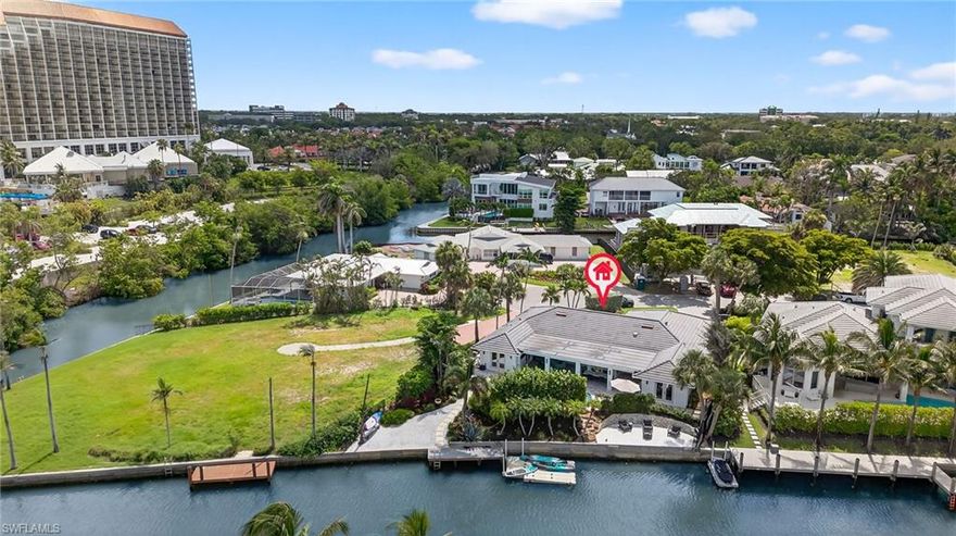 Welcome to 5215 Seashell Avenue in the highly coveted waterfront enclave of Seagate.  Tucked away at the end of a quiet cul-de-sac surrounded by high-end homes is this 4 Bedroom/3 Bathroom waterfront home with 110 feet of canal frontage.
This exceptional home was thoughtfully redesigned by renowned local architect, MHK Architects, and was completely renovated inside and out in 2023.
This home boasts a light and airy mid-century contemporary flair inspired by California ranch-style architecture.
Enter into an open-concept living space with spacious living room replete with vaulted ceilings, wide plank light oak hardwood floors and dramatic contemporary accent wall.  Wall of glass opens to the rear outdoor space seamlessly blending indoor/outdoor living.
A true chef's eat-in kitchen features sleek European-style flat panel cabinetry, oversized island with waterfall edges, stainless steel appliances, bar area plus lovely dining room ideal for entertaining.
Master suite oasis with spacious bedroom with contemporary accent wall, walk-in closet with custom built-ins and a spa-like en-suite bath with custom double vanity, step-in shower, freestanding soaking tub and separate water closet.  Split floor plan with 2 additional guest bedrooms with full baths plus a 4th bedroom currently set up as an office/media room. Convenient laundry room with great storage.  2-car attached garage with epoxy floor.
Outdoor resort-style private oasis with covered living and dining area, TV, gorgeous pool and spa plus a canal front patio with firepit.  A boater's dream with direct water access and a floating dock.
Optional Seagate Beach Club membership offers private beachfront access.
Truly exceptional and a great value for this highly desirable neighborhood.
Easy access to schools, Waterside Shops, downtown Naples, I-75 as well as Naples and Fort Myers airports.