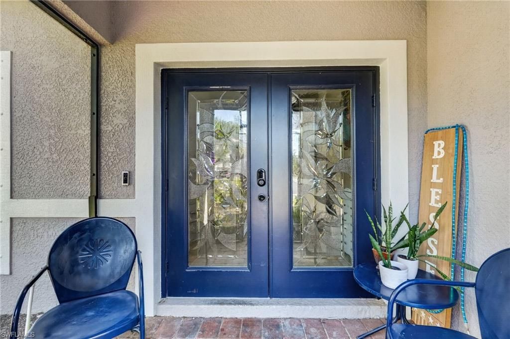 Photo of 2645 Fishtail Palm CT, NAPLES, FL 34120 (MLS # 226015861)