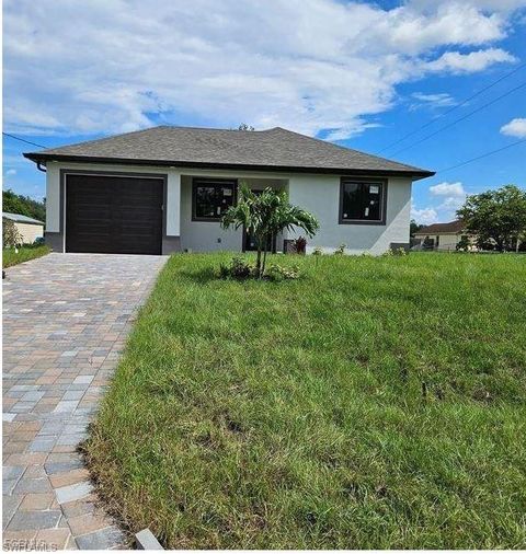 Photo of 128 Nave AVE S, LEHIGH ACRES, FL 33974 (MLS # 2025018663)