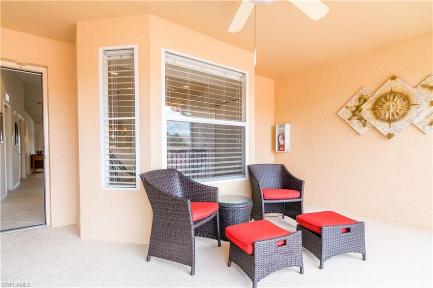 Spectacular long LAKE VIEW. Beautiful corner unit.  Very short walk to the pool.  Garage with additional attic storage.   2 bedroom, 2 bath plus den with large screened lanais front and back! Ceiling fans in all rooms.  Plantation shutters and blinds.   Golf equity is included with this purchase.  Newly renovated golf course and club house that showcases 2 restaurants, outdoor dining, bar and meeting rooms.  Brand new pro shop, locker rooms, fitness center, putting green and range.  Multiple pools, hot tubs and lighted tennis courts.  LOCATION, LOCATiON! Close to many shopping and dining venues.  Only 4 miles from award winning Naples Beaches.  Easy access to I75 and Fort Myers airport. Don't miss this opportunity, make an appointment today!