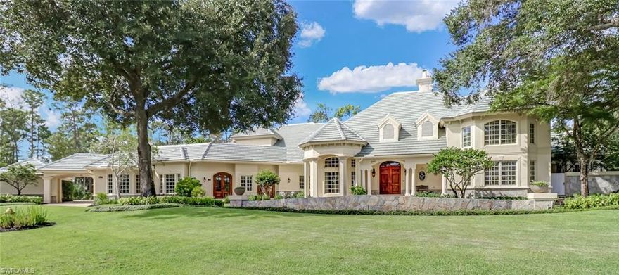 Situated on a 1.3-acre lot, this lovingly designed and custom-built 2-story Country French masterpiece will delight you at every turn.  With 7,302 A/C sq.ft in this home, it was built with entertaining in mind.   The many doors to the outside "pocket completely" for maximum flow and a seamless transition to the large outdoor living area.  With a total area of 14,196 sq.ft. there is an abundance of areas to either gather together or seek out a private sanctuary-----master bedroom with sitting area, 3 en-suite guestrooms (including an attached cabana with living room), his and her offices, game room, "morning coffee patio" off of the kitchen and more.  The oversized 2-car garage and another separate garage that is now housing two golf carts have a large turn-around area in the rear.  Come see for yourself why Quail West was awarded the 2019 "Community of the Year" in Naples and why you would want to call this beautiful house YOUR HOME!  Best of all---a NEW Flat-tiled Roof was just installed in 2020.