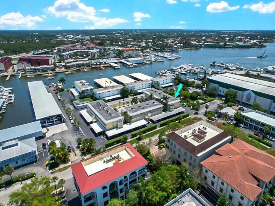ATTENTION BOATERS! This beautiful condo in OLDE NAPLES comes with a deeded 28’ boat slip (with lift) and offers Direct Gulf access! Even more value, a certificate of ownership in the “Adventurer's Club” is included in the sale. Discover the epitome of coastal living at this 2 bedroom, 2 full bath END UNIT condo, nestled on 8th St. in the heart of Olde Naples. With its relaxed beachy chic vibe, this unit serves as your perfect gateway to the coveted Naples Lifestyle. Upon entering, you'll be welcomed by a well thought out open floor plan complete with new luxury vinyl floor, a west-facing newly rebuilt sunroom that fills the space with the warmth of Naples sunshine, and an inviting living space perfect for entertaining. New ceiling fans and upgraded high-end trim have also been added throughout the entire unit for an extra touch. Whether you seek relaxation by the pool or outdoor activities, Marina Manor caters to your every need. Situated in a prime location, this condo is a mere stroll away from the lively 5th Ave and 3rd St, presenting opportunities to explore a diverse range of shops, restaurants, and entertainment options. Also within close proximity are Cambier Park, Tin City, and Naples pristine white sand beaches. Your Naples Lifestyle adventure awaits-don't miss out on making this yours. If you are not a boater, you can rent the boat slip (currently rented through November 2024 at $732/month) for additional stress-free income.