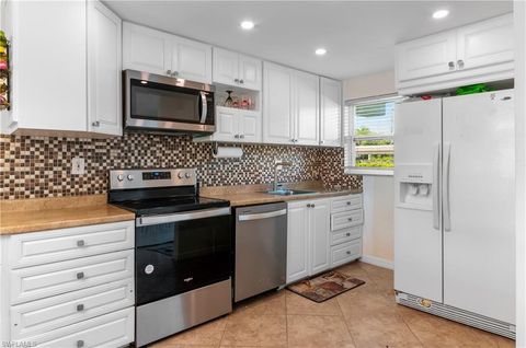 Photo of 49 High Point CIR S #102, NAPLES, FL 34103 (MLS # 226016205)