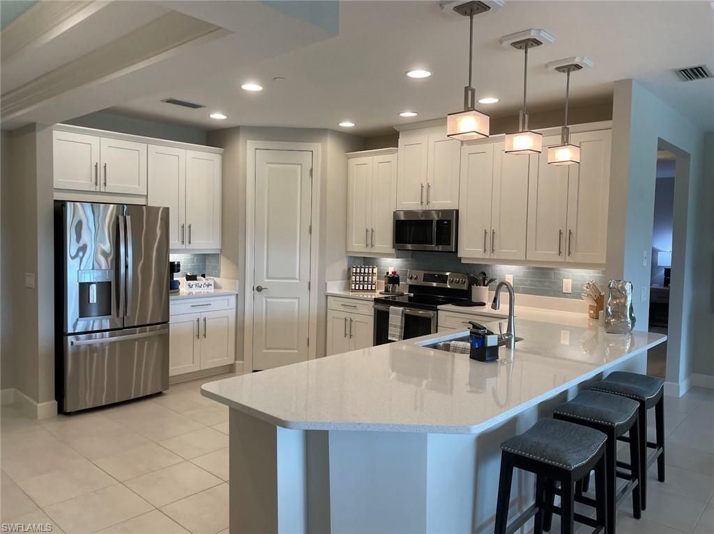 Photo of 9650 Montelanico LOOP #102, NAPLES, FL 34119 (MLS # 226014817)