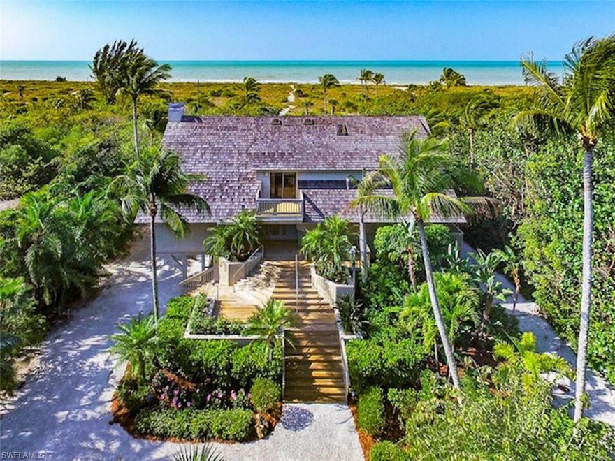 Magnificent beachfront setting on over 2 acres nestled within the beach community of Gulf Ridge. Ultimate privacy within a Sanibel setting second to none. Stunning beach and sunset views from this wonderful 6/5 BR/BA beach home offering multiple sun and entertaining decks, oversized screened in pool and spa, private elevator, generator, storm shutters charming wood shake roof, beautiful landscaping with a beautiful winding driveway. Special property within a special Island location.