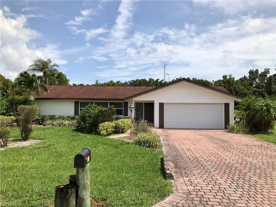 Beautiful Spacious  Move in Ready 4 Bedroom 2 Bath home on 1/2 acres in Cypress Lake Tracts behind Cypress Lake Estates conveniently located  close to Everything.   Highlights include a large screened lanai with pavers and sparkling pool plus large covered area with pool bath  perfect for entertaining or relaxing and enjoying private view of oversized fenced rear yard and shed  for storage.  Updated kitchen with quartz counters, Kraftmaid and Thomasville raised panel cabinets, stainless appliances and 24" neutral tile throughout and new carpet in bedrooms.  Large 4th bedroom off family room has barn style doors, large walk in closet and is perfect for office, playroom or bedroom.  There are loads of closets and storage.  Oversized 550 sq. ft. garage with 150mph wind rated garage door  High impact PGT aluminum windows and 50 year shingle roof in 2005.  AC 2006. Sprinkler on well with new pump in 2016.   Plenty of  room for your boat, RV or work truck.