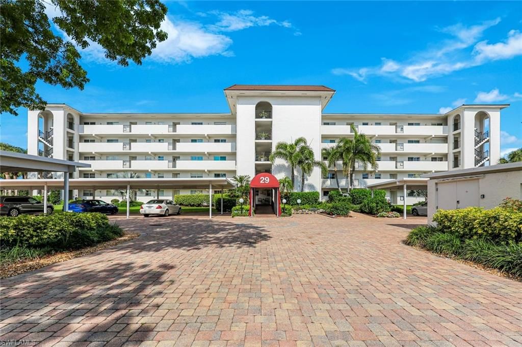 Photo of 29 High Point CIR E #107, NAPLES, FL 34103 (MLS # 226019133)