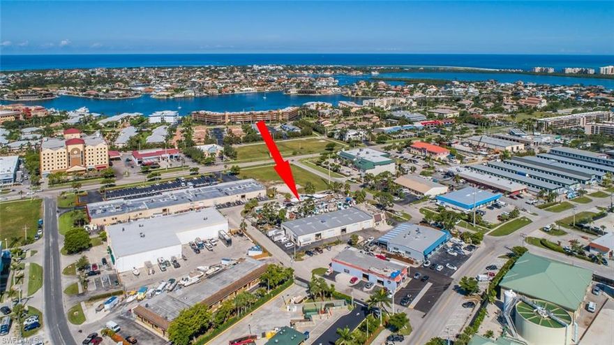 C5 Zoning! C5 is the broadest use commercial zoning on Marco.  Flexspace, outside storage, warehouse, workshop, auto and boat repair, tech, office, retail, equipment yards, self storage and more permitted uses. Site fenced with multiple gate access points. Used for boat and vehicle storage presently.  Land lease in place until December 2018 for interim income. Develop now or in future with income along the way. Offers invited.