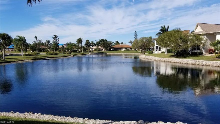 Beautiful Water View with Stunning Sunsets Nightly. Freshly Painted & Updated!  Spacious, First Floor Unit, Ceramic Tile Floors Through-out. Open Floor Plan, Living Room, Dining Room, Kitchen & Lanai With New Flooring.  Great For Entertaining. Spacious Master Bedroom w/Bath & Walk-in Closet. Second Bedroom Has On Suite Bath, Great For Visitors. In Unit Laundry With Side-by-Side Washer Dryer. 2 Covered Parking Spaces & Large Storage Shed Included! Unit Steps From Heated & Cooled Community Pool, Tennis, Pickle Ball, Shuffle Board Courts, Gas Grill. Fantastic Location Walk Or Bike To Beaches & 5th Avenue. Enjoy Fine Dining & Entertainment.  Your Home In Paradise Awaits!