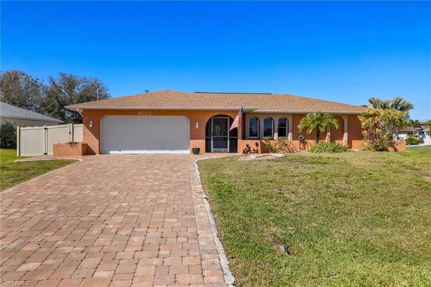 Located on a corner lot in a highly desirable area of Southwest Cape Coral, this charming 3BR / 2BA home offers a comfortable open floorplan and has been very well cared for. The large, screened lanai and heated pool provide abundant space for relaxing and/or entertaining.  The new 6’ high vinyl fence provides plenty of privacy for the spacious backyard and the double gate allows for easy access for boat storage or other toys!  The home has numerous improvements including new roof (2023), paver driveway, 8 new impact resistant windows and 2 doors (2014), as well as electric rolldown shutters (2014).  Don’t miss the opportunity to make this house your home.  Would also be a great investment property. No water damage from Hurricane Ian.  Owner has assumable flood policy.