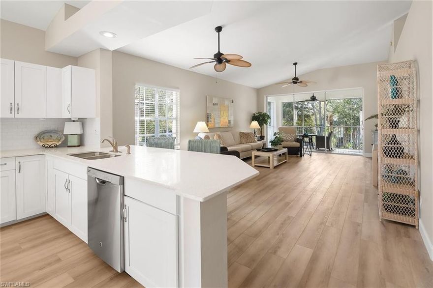 The only fully remodeled furnished corner coach home at or below this price in Naples, Florida, located west of U.S. 41 and just 2.5 miles from the Gulf beaches. Offered turnkey furnished with an oversized garage and the privacy of a single-family residence, this light-filled North Naples property is situated in a desirable Collier County school zone near Kinsale Golf Club and Kalea Bay. A bright south-facing lanai enhances the coastal lifestyle setting, delivering exceptional value west of 41. Designed for move-in-ready convenience, recent improvements include luxury vinyl plank flooring, a remodeled kitchen with stainless steel appliances, two updated baths, in-residence laundry, updated plumbing, new air-conditioning system, new water heater, new roof and fresh exterior paint. With only four residences per building, the layout lives like a private retreat while offering low-maintenance ownership ideal for full-time residents, seasonal buyers or investors. This friendly community features five scenic lakes, two swimming pools, clubhouse, tennis, pickleball and an active social calendar. Optional membership to Tarpon Cove Yacht and Racquet Club provides a private beach shuttle by boat, resort-style pool, Tikki Bar, waterfront dining, fitness center, Har-Tru tennis and bocce leagues and marina boat slips. Minutes from public boat ramps with direct Gulf access and connected by back roads, sidewalks and bike paths to The Ritz-Carlton, LaPlaya, Turtle Club, Mercato, Waterside Shops, Venetian Village and Old Naples, this west-of-41 Naples residence is also conveniently close to grocery stores, medical offices and NCH North Naples Hospital. Offering walkable and bikeable access to beaches, dining, shopping, healthcare and everyday essentials, it delivers an ideal combination of beach lifestyle, golf proximity and long-term investment potential.