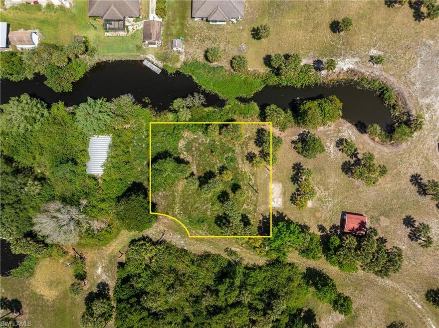 Look at this rare and beautiful .36-acre residential lot on the freshwater Cherokee Waterway Canal with Caloosahatchee River, Gulf of Mexico, Atlantic Ocean, & Lake Okeechobee Access! Located in the Indian Hills Subdivision, just off State Road 80 between LaBelle and Clewiston, and only a golf cart ride away from the Glades Golf Course and Marina Resort! This natural Florida piece of paradise is yours for the taking and features approximately 140’ of canal-frontage, which provides plenty of room for a sprawling dock and more than one boat. This large lot is cleared, has tons of gorgeous palm trees, and is ready for your new home. Just a short ride out to the Caloosahatchee River, you are only minutes from the world-famous Roland Martin's Marina and Tiki Bar in Clewiston, Florida, and both the Gulf of Mexico and Atlantic Ocean are within reach by boat from this property. The seller has a boundary survey available for review that they will also include in the sale!